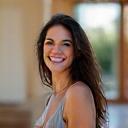 Nagem Disena standing in front of her home